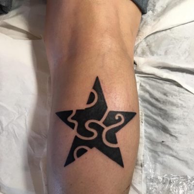 Tattoo étoile mollet
