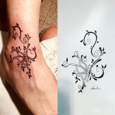 Tattoo arabesque papillon