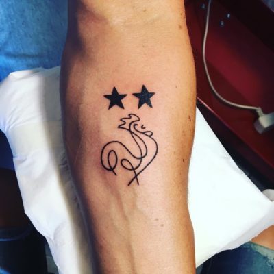 Tattoo coq champion du monde